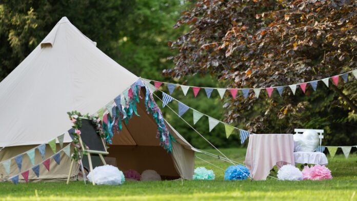 Canvas,Cotton,Bell,Tent,In,The,Yard,Decorated,For,Summer